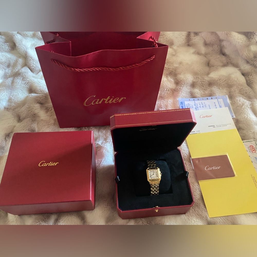 Cartier Women's Gold Watch with Silver Dial